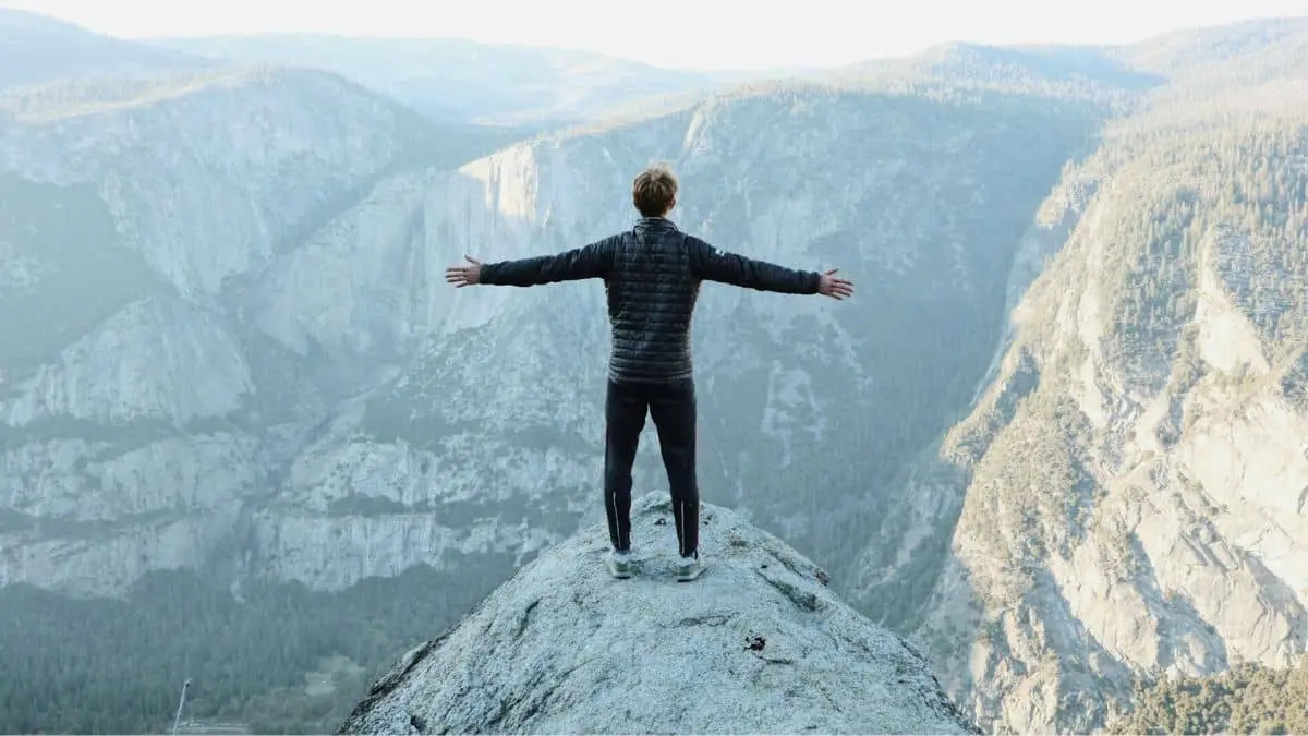 person overcoming challenges to achieve goals mindset success